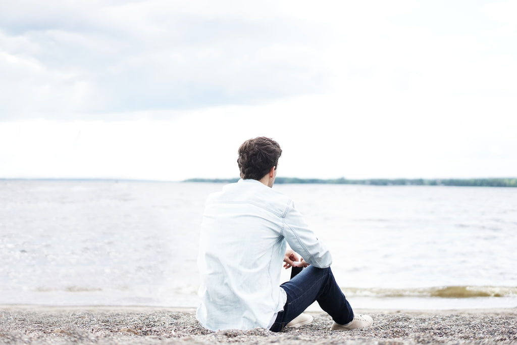 man alone on the beach